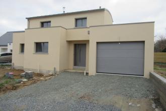 Maison contemporaine avec toiture cintrée en zinc